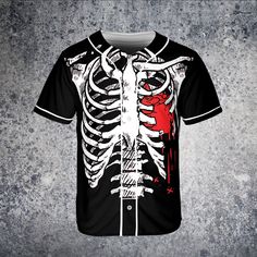 a baseball jersey with the image of a skeleton in red and white on it's chest