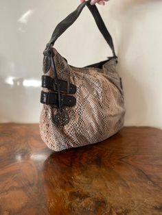 "Style and Co, Faux Leather Purse ,Snake skin fabric print, black, Tan, Shoulder Bag, Non Leather Beautiful soft fabric roomy purse Zip closures Lined w/1 zip pocket and 2 slip pockets PLEASE SEE MEASUREMENTS Measures: 15\" x 12\" x 5\" Strap: drop 8\" Excellent condition NK901DN Style and Co, Faux Leather Purse ,Snake skin fabric print, black, Tan, Shoulder Bag, Non Leather" Everyday Snake Print Satchel Bag, Leather Snake Print Bags For Daily Use, Daily Use Leather Snake Print Bags, Daily Use Leather Bags With Snake Print, Daily Use Snake Print Leather Bags, Brown Leather Shoulder Bag With Snake Print, Leather Snake Print Satchel Shoulder Bag, Leather Satchel Shoulder Bag With Snake Print, Leather Snake Print Satchel Bag