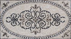 an intricately designed tile with black and white designs