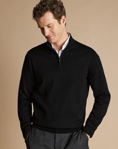 Merino Zip Neck Jumper - Black | Men's Charles Tyrwhitt Zip Neck Sweater - Black Size Large Merino High Neck Zip Sweater Men, Black Quarter Zip Outfit Men, Mens Half Zip Sweater Outfit, Quater Zipper Outfit Men, Black Sweater Outfit Men, Black Quarter Zip Outfit, Quarter Zip Outfit Men, Half Zip Sweater Outfit, Black Jumper Outfit