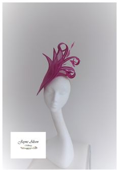 ''Stunning hatinator in Heather pink, pale fuchsia  sinamay.   3 large petals create a striking effect whilst the elongated petals curl and twist to create a beautiful shape.  A cluster of coq feathers create movement as they dance in the breeze on this simply elegant headpiece. Sits on a headband. This item has sold, however, similar pieces can be made in a variety of colours.  Please ask for details.  As every piece is handmade, some differences can occur from the photos listed on this site. Pink Kentucky Derby Fascinator With Structured Crown, Pink Structured Crown Fascinator For Kentucky Derby, Pink Fascinator For Kentucky Derby With Structured Crown, Pink Structured Crown Fascinator For Wedding, Pink Sinamay Fascinator For Church, Pink Fascinator For Races With Pinched Crown, Pink Wedding Hat With Structured Crown, Pink Pinched Crown Fascinator For Formal Occasions, Pink Formal Fascinator With Pinched Crown