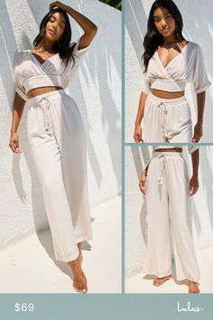 The Lulus A Perfect Vacation Beige Two-Piece Swim Cover-Up Jumpsuit pairs perfectly with the warm beaches and sunny days! This cute two-piece jumpsuit is composed of lightweight and airy woven fabric (with a subtle embossing pattern throughout) that forms a crop top with a surplice neckline, short dolman sleeves with rolled sewn cuffs, and a smocked banded hem. The matching pull-on bottoms feature a high, drawstring waistband and flowy wide-leg pants. Fit: This garment fits true to size. Length: Summer Jumpsuit With Tie Waist For Day Out, Solid V-neck Summer Sets, Spring V-neck Beachwear Sets, Casual Beige Sets For Vacation, Two-piece V-neck Beach Set, Summer Brunch Jumpsuits And Rompers With Elastic Waistband, Two-piece Summer Vacation Bottoms, Summer V-neck Jumpsuits And Rompers With Elastic Waistband, Two-piece Spring Vacation Bottoms