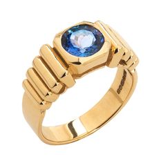 Handcrafted in Italy in 18 karat gold, inspired by a mix of Art Deco influences and Incan motifs, this elegant ring is the perfect jewel to add to your everyday attire - combining originality, quality and style! 18 karat Yellow Gold approx 10gr 1 round brilliant Tanzanite 1.55ct Handcrafted in Italy Luxury Emerald Ring With Tension Setting, Modern Yellow Gold Sapphire Ring With Polished Finish, Modern Yellow Gold Sapphire Ring For Formal Events, Modern Yellow Gold Sapphire Ring For Formal Occasions, Modern Topaz Ring With Center Stone In Yellow Gold, Modern Yellow Gold Sapphire Ring With Center Stone, Modern Yellow Gold Topaz Ring With Center Stone, Unique Yellow Gold Topaz Ring For Formal Occasions, Modern 14k Gold Topaz Ring