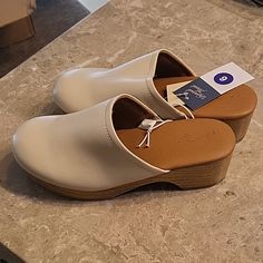 Cream Colored Magnolia Clogs By Universal Thread. Memory Foam Insoles, Wood Grain Medium Heel, Size 6. Spring Slip-resistant Slip-on Clogs, Spring Slip-on Slip-resistant Clogs, Synthetic Clogs With Cushioned Footbed Medium Width, Spring Synthetic Clogs Of Medium Width, Medium Width Synthetic Clogs For Spring, Synthetic Clogs With Removable Insole, Medium Width, Comfortable Closed Toe Synthetic Clogs, Comfortable Synthetic Closed Toe Clogs, Medium Width Synthetic Slip-on Clogs