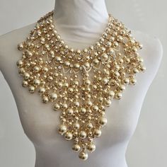 Huge Faux Pearl Bib Statement Necklace, Showstopper, Gigantic, Drippy, Hollywood. Hard To Find Such A Giga Pearl Necklace. Layer After Layer, Strand Upon Strand Of Faux Pearls Of All Sizes, Combined With Clear, Shiny Rhinestones, All Mounted On Goldtone Metal, This Piece Of Jewelry Is Phenomenal. Earrings Included Will Update Photos Soon. Never Used, Only Displayed, Perfect Condition. Gold Dangle Pearl Necklace For Party, Gold Dangle Bridal Necklace For Party, Glamorous Gold Pearl Chain Necklace, Glamorous Gold Pearl Necklace For Party, Glamorous Gold Pearl Necklace, Round Pearl Drop Necklace For Party, Gold Dangle Rhinestone Necklace, Gold Pearl Chain Jewelry For Party, Party Gold Jewelry With Pearl Chain