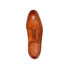 Expertly crafted from supple calfskin the American-made Sanderson wingtip is detailed with intricate perforations and burnished for a rich depth of color. Timeless Cognac Dress Shoes With Brogue Detailing, Wingtip Calf Leather Oxfords For Galas, Calf Leather Wingtip Oxfords For Galas, Luxury Calf Leather Derby With Brogue Detailing, Luxury Brogue Derby Shoes In Calf Leather, Luxury Wingtip Calf Leather Oxfords, Luxury Wingtip Oxfords In Calf Leather, Luxury Wingtip Oxfords With Leather Lining, Luxury Calf Leather Wingtip Oxfords