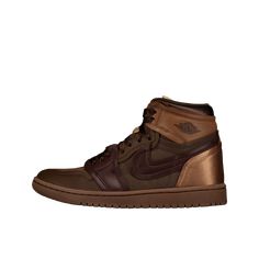 The perfect fall sneaker: W Air Jordan 1 High Method of Make 'Archaeo Brown'. Featuring a luxurious mix of archaeo brown, cacao wow, baroque brown, and earth tones, this AJ1 high mom boasts premium leather and mesh details, accented by satin-like laces and iconic Jumpman logos. With a foam midsole and rubber outsole, these sneakers not only make a statement, but provide ultimate comfort and durability. Upgrade your sneaker collection today. Brown High-top Sneakers With Laces For Streetwear, Brown Custom Sneakers With Boost Midsole, Brown Custom Sneakers With Round Toe And Laces, Brown Custom Lace-up Sneakers With Boost Midsole, Brown Sneakers For Streetwear With Round Toe, Brown Sporty High-top Sneakers For Streetwear, Brown Leather High-top Sneakers With Laces, Brown Leather High-top Sneakers, Brown Round Toe Sneakers For Streetwear