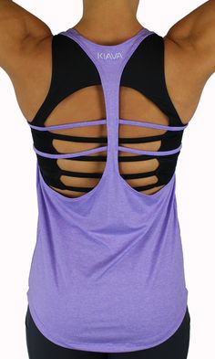 The Suspension Tank Top is a fun strappy design to keep you cool and comfortable during your workout. The open back compliments your favorite sports bra and allows full layering. It is a relaxed, looser fit tank top. Because it is so light, non restrictive, and breathable, it hardly feels like you are wearing a tank to Racerback Tops With Built-in Bra For Light Sports, Sporty Tank Top With Built-in Bra For Yoga, Racerback Top With Built-in Bra For Workout, Athleisure Tank Top With Built-in Bra For Light Exercise, Casual Tank Top With Built-in Bra And Strappy Back, Stretch Training Activewear With Straps, Sporty T-back Activewear For Light Exercise, Athleisure Tank Top With Built-in Bra For Training, Strappy Gym Tops With Built-in Bra