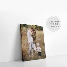 an image of a family posing for a photo in a field with the text, custom photo canvass