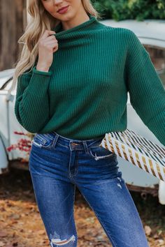 Magnolia Exclusive! 'Tis the season to stand out in beautiful blue knit! Our Winter Wonderland Blue Mock Neck Sweater features a slouchy rolled mock neck sweater silhouette designed cozy ribbed knit sweater material. This layer-friendly knit is the perfect gift to give or get in all 3 colors; Red, Green, & Blue! Rolled mock neck Drop shoulders Long sleeves Slouchy bodice Soft rib-knit fabric 100% Acrylic Machine wash cold, hang dry Color: Green Colors may vary on different viewing devices Size a Sorority Rush Outfits, Rush Outfits, Holiday Knits, Gameday Dress, Loungewear Dresses, Casual White Dress, Cozy Holiday, Game Dresses, Sweater Material