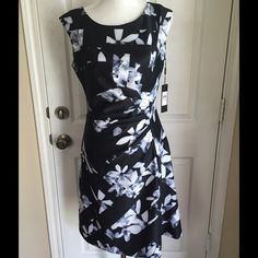 Karl Lagerfeld Paris Dress Karl Lagerfeld sleeveless dress, 93% poly 7% spandex, lined, zips in back                                   Size 8 Waist 30" Bust 34" Length 38"                   Size 10 Waist 31" Bust 36" Length 38"                    Size 12 Waist 32" Bust 38" Length 38" Karl Lagerfeld Paris Dresses Midi Fitted Sleeveless Dress With Floral Print, Fitted A-line Sleeveless Elastane Dress, Fitted Sleeveless Dress With Flattering Silhouette For Spring, Fitted Flattering Sleeveless Dress For Spring, Sleeveless Elastane Dress With Floral Print, Fitted Sleeveless Dress For Spring, Knee-length Sleeveless Elastane Dress For Spring, Fitted Flattering Sleeveless Spring Dress, Formal Fitted Sleeveless Dress With Floral Print