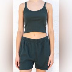 Basic, Scoop-Neck, Ribbed Cotton Tank Top With A Cropped Fit. Fabrics: 100% Cotton Measurements: 17" (43 Cm) Length, 13" (33 Cm) Bust Made In: Europe Casual Scoop Neck Crop Top For Loungewear, Casual Short-length Crop Top For Loungewear, Casual Short Length Crop Top For Loungewear, Casual Short Crop Top For Loungewear, Cotton Tank Crop Top For Loungewear, Cotton Short Length Crop Top, Fitted Short Length Tops For Everyday, Casual Relaxed Fit Crop Tank Top, Casual Green Scoop Neck Crop Top