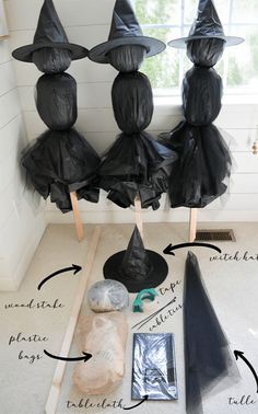 some black witches hats sitting on top of a floor