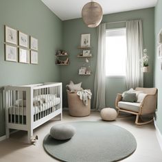 a baby's room with green walls and white furniture