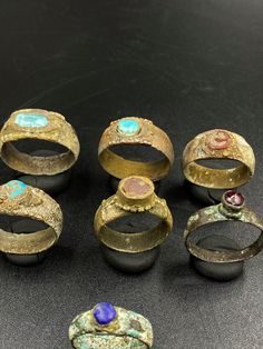 The Lot Of Total 7 Bronze Rings With Lapis ,Turquoise ,Garnet and Carnelian Probably From Ancient Achaemenid Empire Central Asia. Best Items For Collections and Study . Fast and Free Shipping World Wide. Ceremonial Byzantine Jewelry With Cabochon, Ceremonial Byzantine Cabochon Jewelry, Byzantine Ring With Cabochon, Artisan Gold Turquoise Ring, Artisan Rings With Patina For Collectors, Gold Bohemian Multi-stone Rings, Bronze Patina Ring, Bohemian Gold Multi-stone Rings, Handmade Collectible Byzantine Jewelry