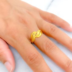 This 22k gold ring features a chic radiant design, perfect for adding elegance to any outfit. Weighing 3.0 grams, it showcases a yellow gold finish that enhances its sophisticated and stylish appearance. Sized at 8, with resizing available, this ring combines style and practicality, making it ideal for daily wear or special occasions. Suitable for those who appreciate refined and fashionable jewelry, this ring brings a touch of luxury and radiant charm to your collection. PRODUCT DETAILS Gold Purity(karat): 22k Gold Weight(grams): 3.0 Item Finish: Yellow Gold Ring Size: 8 Ring Sizing Available: Yes Elegant 22k Yellow Gold Rings, Elegant Yellow Gold Engraved Toe Ring, 22k Gold Diamond Wedding Ring, Elegant 22k Gold Engraved Ring Hallmarked, Elegant 22k Gold Diamond Ring, 22k Gold Engraved Ring For Anniversary, Elegant 22k Gold Diamond Ring For Anniversary, Formal Gold Rings With Simple Design, Elegant 22k Gold Engraved Ring