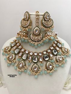 Premium quality Kundan Necklace comes with elegant Jhumki Earrings and Tikka/ trendy Indian bridal set/Premium Quality Polki and Kundan Jewelry/sky blue/light feroza/light firozi All items are shipped from Brampton, Ontario, Canada. If you need your item by a certain day, please reach out to us for express delivery option before placing the order so that we can update the shipping for you. Standard shipping/delivery timeline Below are the delivery timeline estimates. We dispatch all orders by th Blue Kundan Bridal Earrings For Wedding, Turquoise Temple Jewelry For Wedding, Blue Round Kundan Necklace For Wedding, Festive Turquoise Bridal Necklace For Wedding, Festive Turquoise Bridal Necklace, Turquoise Kundan Chandbali Jewelry, Festive Turquoise Kundan Necklace For Wedding, Wedding Turquoise Kundan Necklace, Turquoise Kundan Necklace With Meenakari For Wedding