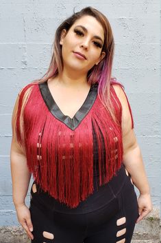 Five and Diamond's new Fringe V Neck Top is perfect for festivals, with or without a bra underneath! Also great in the city as a layering piece over a tank or bandeau bra. Either way, it's really fun to dance in. Black Leather Collar Red poly fringe One Size Designed by Five and Diamond Ethically handcrafted Pairs well with the entire Cage collection Edgy Red Crop Top For Summer, Edgy Red Tops For Club, Red Crop Top For Summer Clubbing, Red Summer Crop Top For Club, Red Punk Party Tops, Fitted Fringe Crop Top For Festivals, Red Fringe, Bandeau Bra, V Neck Top