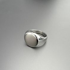 Clean, smooth band with a circular face in a polished finish Stainless Steel  Ring, 10mm This item can be custom engraved. Face Polish, Mens Pinky Ring, Stainless Steel Ring, Polish Silver, Polished Stainless Steel, Pinky Ring, Men's Rings, Silver Material, Stainless Steel Rings