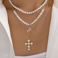 Attached layers Includes everything pictured Material: gold plated brass, crystals Length: 15" + 3" extension Cross Pendant size: 0.95" x 1.25" IMPORTED Pearl Cross Necklace, Pastel Necklace, Rectangle Necklace, Crystal Cross, Gold Cross Necklace, Beaded Cross, Gold Cross, Cross Pendant, Heart Necklace