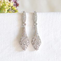 Bridal Earrings, Crystal Wedding Earrings, Art Deco Dangle Drop Earrings, Vintage Style Wedding Bridal Jewelry, Rose Gold Earrings, REGINA by GlamorousBijoux on Etsy https://www.etsy.com/listing/578725360/bridal-earrings-crystal-wedding-earrings Ornate Dangle Bridal Earrings For Formal Occasions, Silver Drop Earrings With Intricate Design, Vintage Pierced Diamond Earrings For Wedding, Vintage Wedding Diamond Earrings, Pierced, Vintage Wedding Diamond Earrings, Vintage White Diamond Earrings For Wedding, Vintage White Diamond Wedding Earrings, Ornate Wedding Diamond Drop Earrings, Vintage White Gold Earrings For Wedding