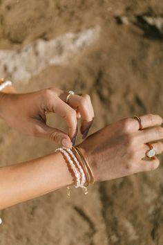 This beaded bracelet features a collection of tiny white freshwater pearls to capture the enticement of Hawaii's white sand beaches. Wear this gold pearl bracelet alone or stracked for a classically elegant allure. ✦ DETAILS ✦ ✧ Name: Maile (MIE-leh) - vine. ✧ Adjustable Length from: 6"-7.5" Inches. ✧ White 3-4mm Freshwater Pearls. ✧ 14kt Gold Filled Components, Extender, and Clasp. ✧ All Ke Aloha Jewelry pieces come packaged thoughtfully, beautifully, and ready for gift giving. ✧ Unless otherwi Adjustable Bracelet With Pearl Charm, Pearl Charm Beaded Bangle Bracelet As Gift, Delicate Beaded Bracelets With Pearl Charm, Dainty Adjustable Pearl Bracelet With Charm, Beaded Bangle Bracelet With Pearl Charm As Gift, Dainty Adjustable Beaded Bracelets With Pearl Charm, Gift Beaded Bangle Bracelet With Pearl Charm, Hand-strung Pearl Bracelet, Adjustable Pearl Oyster Bracelet Jewelry