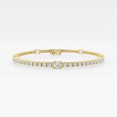 Enjoy next level sparkle with the Empowering Radiant Bracelet. This exquisite bracelet features standout lab grown radiant diamonds against an accompanying row of pave diamonds and 14K gold. This dazzling design will make you feel bold and beautiful wherever you go. Gold Diamond Bracelet With Brilliant And Baguette Cuts, Gold Diamond Bracelet With Baguette And Brilliant Cut, Yellow Gold Baguette Cut Tennis Bracelet For Anniversary, 14k Gold Brilliant Cut Tennis Bracelet For Wedding, Gold Moissanite Jubilee Diamond Bracelet, Gold Moissanite Diamond Bracelet With Brilliant Cut, Elegant Yellow Gold Plated Tennis Bracelet, Elegant Yellow Gold Rectangular Tennis Bracelet, Flexible Yellow Gold Diamond Tennis Bracelet