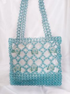 "Light blue daisy Crystal bead bag, Bead shoulder bag, Women Bead bag,Light blue Bead bag, Blue Crystal Bead Bag, Women handbags Dimensions - Width: (21 cm.) - Height: (19 cm.) - Depth: (7cm.) My bags are 100% handmade.This size making it perfect to hold your keys, cards, money. I hope you collect great memories with this bag. All items are made in a clean, smoke-free home SHIPPING - This clutch is made and ready to ship - Ships worldwide from İstanbul, Turkey - Processing time prior to shipping Crystal Bead Bag, Pearl Bags, Y2k Handbag, Blue Y2k, Pearl Bag, Blue Daisy, Beaded Purses, Bag Light, Pink Beads