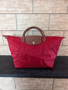 Longchamp Le Pliage  Women's  Bag Tote Handbag Red Nylon Size: 46/27/21cm 18.11"/10.62"/8.26" There are defects, visible in the photo. In good used condition Women's Bag, Tote Handbag, Longchamp Le Pliage, Womens Tote Bags, Tote Handbags, Ukraine, Bag Lady, Tote Bag, Handbags