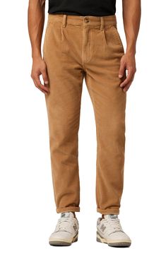 Elevated by slanted pockets and subtle pleats, these garment-dyed corduroy trousers have a tapered fit that's cropped to show off your kicks. 31" inseam; 13" leg opening; 10" front rise 100% cotton Machine wash, tumble dry Imported Casual Corduroy Bottoms With Welt Pockets, Casual Corduroy Pants With Welt Pockets, Corduroy Bottoms With Patch Pockets, Corduroy Straight Leg Bottoms With Patch Pockets, Classic Relaxed Fit Corduroy Bottoms, Spring Corduroy Tapered Leg Pants, Spring Tapered Leg Corduroy Pants, Classic Corduroy Tapered Leg Bottoms, Corduroy Tapered Leg Pants With Welt Pockets