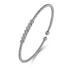 Seven sparkling pave diamonds, totaling 0.13 carats, encircle the top of this versatile beaded bracelet. Perfect for any occasion, it exudes elegance, sophistication, and grace. A lovely addition to Gabriel's Bujukan collection, this bangle can be easily paired with other styles from the collection. Bracelet size 6.25 in 14K white gold and 6.25 in 14K Yellow gold available for same day shipping. Other sizes take 2-3 weeks for Gabriel to create and will ship immediately after completion. Rush del Gabriel Jewelry, Bracelet Box, Jewelry Appraisal, Womens Wedding Bands, Shop Engagement Rings, Mens Wedding Bands, Wedding Men, Purple Amethyst, Pink Sapphire