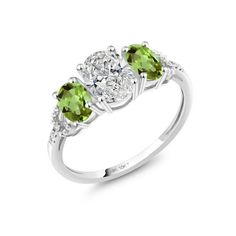 three stone ring in white gold with green tourmaline and diamond sidestones