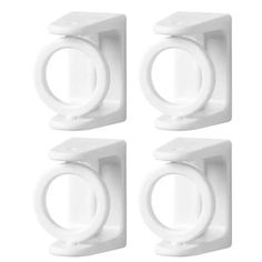 four white plastic door stoppers on a white background