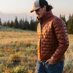 Embrace the spirit of adventure with the Teton Leather Jacket, a tribute to the rugged majesty of Wyoming’s Teton Mountain Range. Its rich, full-grain leather evokes the grandeur of these storied peaks, making a statement that is both daring and refined—striking the perfect balance between boldness and restraint. Crafted from premium full-grain sheep leather that develops a handsome patina with wear, the jacket features a modern brick-stitch pattern for a contemporary update. The lightweight dow Winter Outdoor Leather Jacket, Winter Leather Jacket For Outdoor, Brown Quilted Jacket For Outdoor Winter Use, Brown Quilted Jacket For Winter Outdoor, Fall Leather Jacket For Outdoor, Leather Jacket For Outdoor Fall Season, Fall Outdoor Leather Jacket, Brown Long Sleeve Quilted Jacket For Outdoor, Rugged Outdoor Sport Coat For Fall