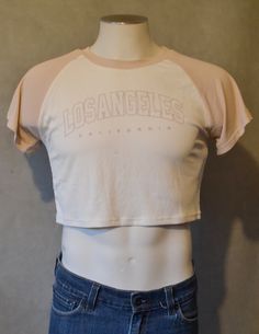 This adorable cropped Los Angeles top  is great for any outfit.  small Casual Cropped T-shirt For Streetwear, Casual Stretch Cropped T-shirt, Stretch Summer Crop Top With Letter Print, Summer Stretch Crop Top With Letter Print, Pink Cropped T-shirt For Spring, Sporty Cropped Crop Top For Streetwear, Sporty Cropped T-shirt For Spring Streetwear, Summer Cotton Cropped Hem T-shirt, Sporty Short Sleeve Cropped T-shirt For Spring