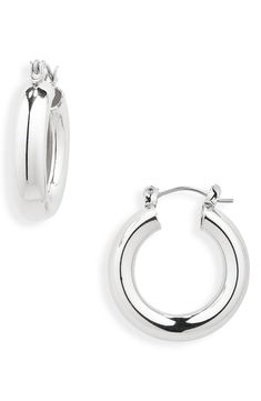 A modern tubular design and polished sterling silver–dipped finish will have these huggie hoop earrings in high rotation. 1" hoop diameter Hinge with snap-post closure Sterling silver dipped Imported Not available for sale and shipment to Germany Modern Small Hoop Hinged Earrings, Modern Small Hinged Hoop Earrings, Mama Coco, Silver Earrings Hoops, Silver Sisters, School List, Medium Hoop Earrings, Birthday Board, Huggie Hoop Earrings