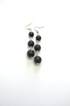 Simple and Elegant black Onyx drop earrings Elegant earrings made of high quality natural matt black onyx - simple and beautiful.This earrings is a good accessory for work or everyday use. Dress these up or down; a great basic.Most of my jewelry can easily be resized at no additional charge. I would love to assist you with your custom order, so please do not hesitate to contact with me.All my earrings is made with care and handmade.Earrings details:Length: Long dangle earrings measure 55 mm from Minimalist Black Evening Jewelry, Minimalist Handmade Black Earrings, Elegant Adjustable Matte Black Jewelry, Elegant Matte Black Adjustable Jewelry, Black Dangle Linear Earrings, Nickel Free Black Long Drop Earrings, Black Dangle Linear Earrings For Pierced Ears, Black Long Drop Earrings With Ear Wire, Nickel-free Black Long Drop Earrings