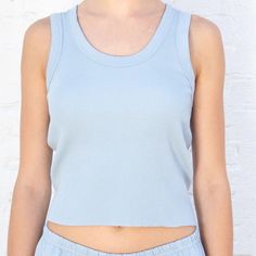 Light Blue Brandy Melville Conner Tank Nwot Light Blue Sleeveless Tank Top For Loungewear, Blue Ribbed Cotton Tank Top, Blue Cropped Top For Loungewear, Blue Cropped Crop Top For Loungewear, Blue Fitted Tank Top For Loungewear, Light Blue Ribbed Sleeveless Tank Top, Light Blue Ribbed Tank Top, Blue Ribbed Tank Top For Summer, Blue Stretch Tank Top For Loungewear