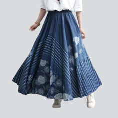 Live the Bohemian life with our 2023 Spring-Summer Collection flared long denim skirt! With an eye-catching embroidered pattern. high waist. and rubber closure. this skirt is the perfect union between classic style and contemporary chic.Why It's Your Next Wardrobe EssentialThe long. flared silhouette of this skirt makes it a timeless classic. while the intricate embroidery adds an air of modern sophistication. The high waist and rubber closure keep it comfortable and secure. ensuring you look yo Flared Denim Skirt For Summer, Denim Blue Flare Skirt For Spring, Spring Flare Denim Blue Skirt, Spring Denim Blue Flare Skirt, Casual Flare Skirt For Summer, Bohemian Indigo Bottoms For Spring, Spring Flared Cotton Skirt, Flowy Cotton Denim Skirt, Long Cotton Denim Skirt For Summer