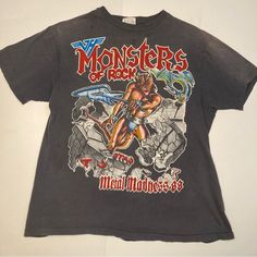 Tee Is In Used Condition And Has Some Fading And Discoloration. Also Has A Few Small Holes As To Be Expected From An Item This Old. One Owner. Rock N Roll! Metallica, Dokken, Scorpions, Van Halen! I Do Video All Packaging And Shipments To Ensure Legitimacy. 90s Style Gray Graphic Print Top, Punk Washed Black Tops With Graphic Print, Washed Black Punk Tops With Graphic Print, 90s Gray Graphic Print Top, Vintage Band T Shirts Rockabilia, Cotton Rock And Roll Graphic T-shirt, Rock And Roll Short Sleeve T-shirt With Text Print, Black Rock T-shirt With Skull Print, Rock And Roll Fan Merchandise Short Sleeve T-shirt