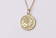 "14k Gold Tiny Rose Necklace, Personalized Rose Name Necklace, Dainty Rose Jewelry, Custom Floral Necklace, Flower Necklace Engraved, Gift for Her, Necklace for Woman, Necklace for Man, Gold Gift Necklace, Custom Engraved Charm * Material: Pendant and chain are 14k Yellow Solid Gold or 925 Sterling Silver * Pendant thickness: 0.70 mm * Inner diameter of jump ring: 4 mm * Pendant diameter: 0.55 inch (14 mm) 0.60 inch (15.30 mm) 0.65 inch (16.50 mm) 0.70 inch (17.78 mm) 0.75 inch (19.10 mm) * Chai Gold Necklaces With Roses For Anniversary, Rose-colored Rose Design Round Necklaces, Round Rose Design Necklace For Wedding, Formal Rose Gold Necklace With Rose Design, Formal Rose Design Rose Gold Necklace, Wedding Necklace With Round Pendant And Rose Design, Gold Necklaces With Roses For Wedding, Wedding Necklace With Round Rose Pendant, Gold Wedding Necklaces With Rose Details