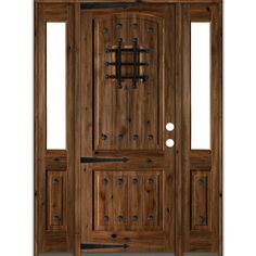 the front door is made out of wood and has two sidelights on each side