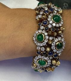 Luxury Cabochon Bangle Jewelry, Formal Multi-stone Emerald Jewelry, Designer Green Jewelry For Formal Occasions, Luxury Multi-stone Emerald Jewelry, Luxury Wedding Bracelet With Cabochon, Luxury Cabochon Bracelets For Wedding, Green Cabochon Jewelry For Party, Luxury Diamond Jeweled Bracelets, Designer Green Jewelry For Anniversary