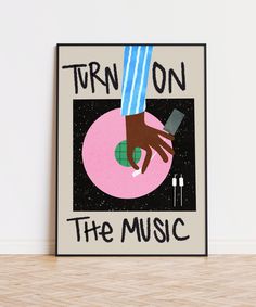 a poster that says turn on the music with an image of a hand holding a cell phone