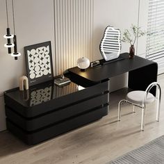 a black desk with two chairs and a mirror on it in a room that has white walls