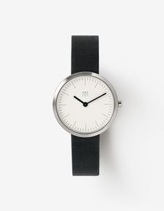 Experience timekeeping in its purest form with The Minimalist, a distilled version of The Artisan series. Tailored for those who appreciate minimalism, these petite watches for women showcase clean-cut simplicity. Featuring a small watch face and pared-down markings, The Minimalist reiterates classic simplicity with minimal styling cues. Elevate your style with the understated elegance of minimalist watches designed for smaller wrists. Discover the essence of time, perfectly scaled down for ... Small Watch, Minimalist Watch, Pure Form, Watches For Women, Unisex Watches, Minimalist Wardrobe, Classic Watches, The Minimalist, Understated Elegance