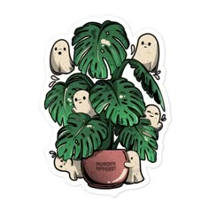 a potted plant with ghost stickers on it