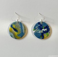 Lightweight polymer clay disc earrings in a blue and opal mosaic pattern that reminds me of Starry Night. Swirly blues with a bit of flash. My daughter in law said they were perfect for Taylor Swift's Midnights Era. Baked polymer clay with a resin glaze. Sterling silver earwires.  Just over 2 inches long. Fun, light and swingy. Artistic Blue Round Earrings, Blue Artsy Resin Earrings, Artsy Blue Resin Earrings, Artsy Blue Polymer Clay Earrings, Artsy Round Blue Jewelry, Artsy Blue Round Jewelry, Sterling Silver Turquoise Earrings, Silver Turquoise Earrings, Silver Metal Clay