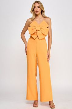 bow front jumpsuit with optional straps Brand: Milk & Honey Style: 39549RL Fabric: 95% Polyester, 5% Spandex Details: Spring Party Strapless Jumpsuit In Solid Color, Spring Party Jumpsuits And Rompers With Bow, Spring Party Jumpsuit With Bow, Fitted Summer Jumpsuits And Rompers With Bow, Chic Summer Jumpsuits And Rompers With Bow, Plus Jumpsuit, Honey Color, Milk Honey, High Waisted Jean Shorts