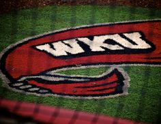 an image of a logo on the ground for a baseball team that is going to win